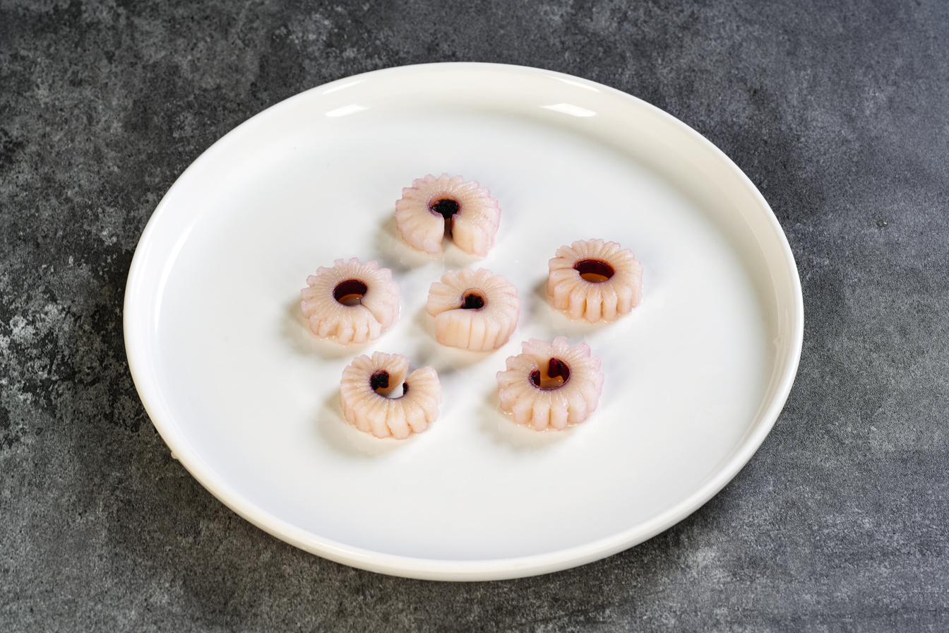 Wheel-roll Squid — IQF retail presentation